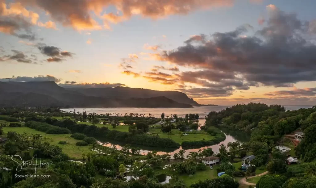 Sunset over Hanalei Bay with the river meandering its way to the ocean. Prints available in my online gallery