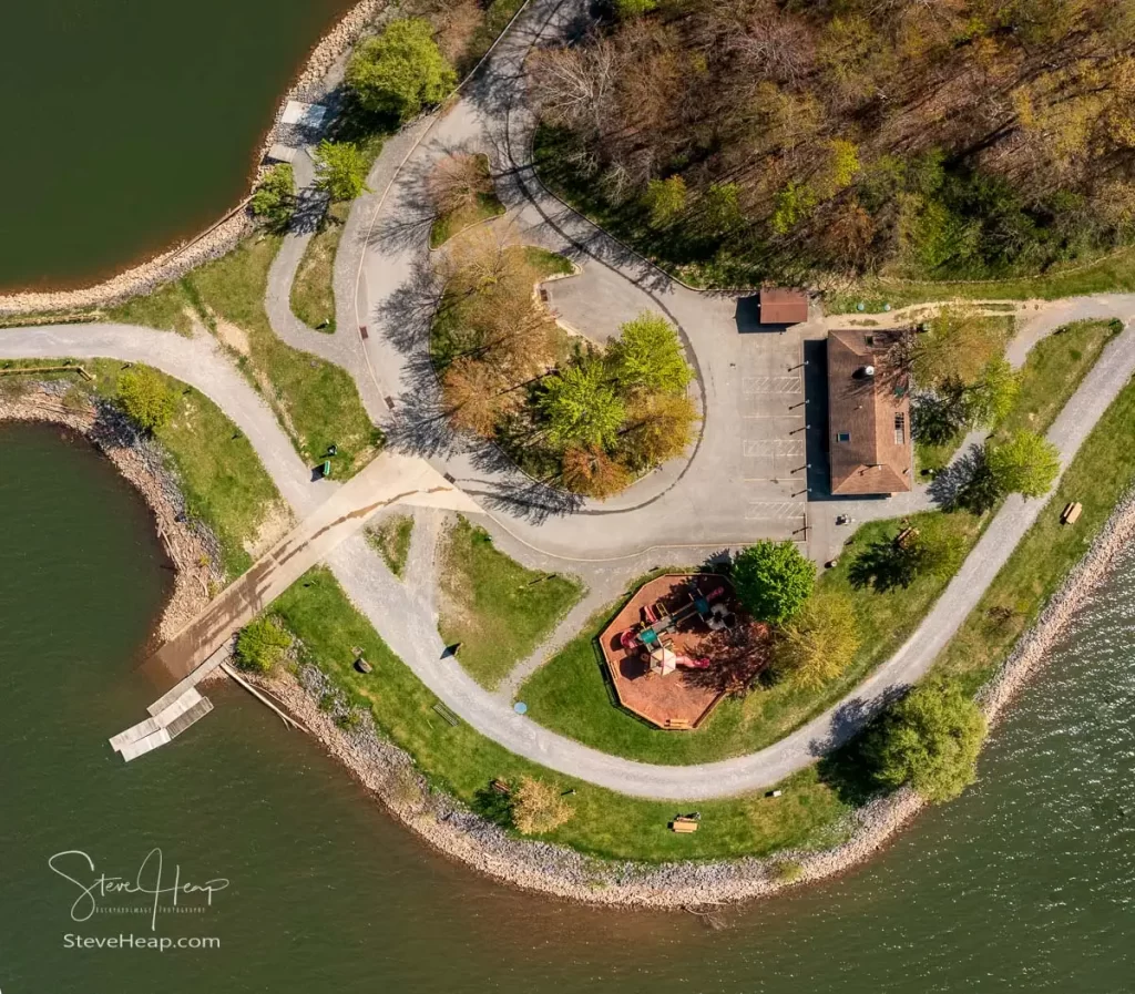 Aerial view looking straight down on the childrens play park at Cheat Lake Park near Morgantown West Virginia on a beautiful calm spring morning