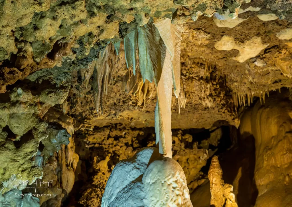 Rock formations with stalactites and stalagmites in Inner Space Cavern near Georgetown, TX