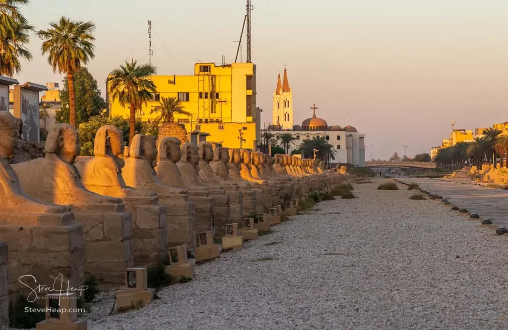 The Avenue of Sphinxes heading towards Karnak Temple at sunset