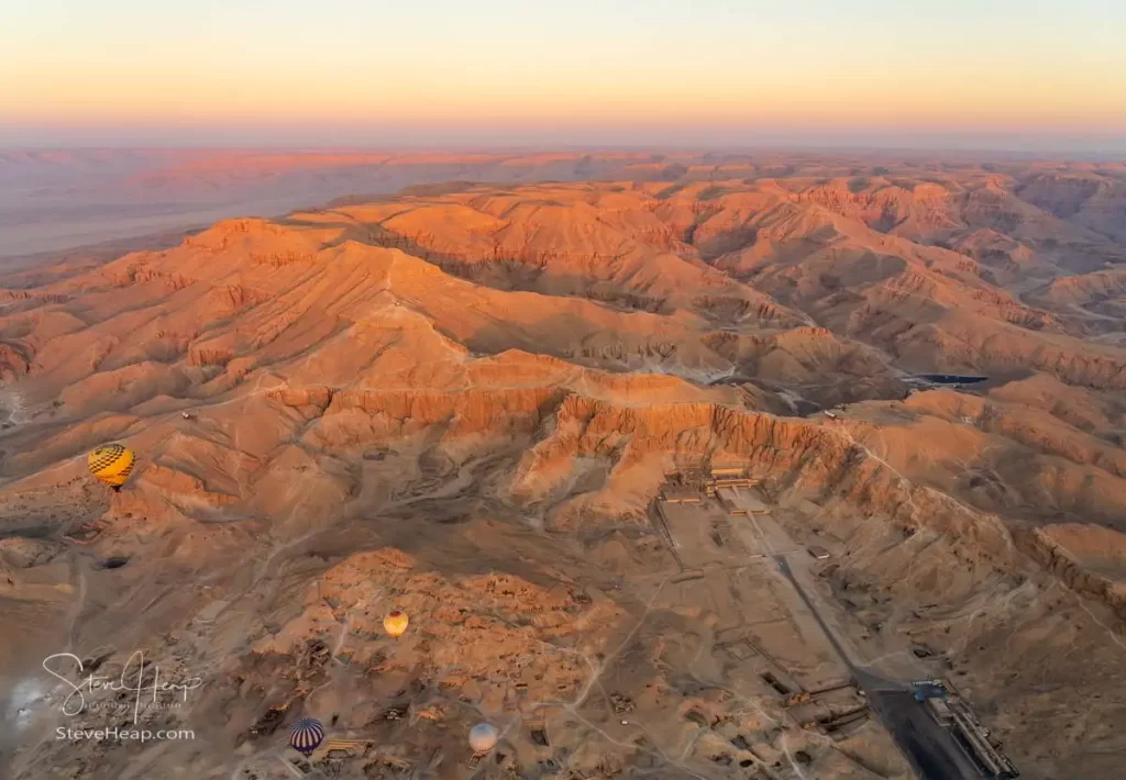 With increasing altitude, you see over the first mountain range to the Valley of the Kings immediately behind and further west into the Sahara