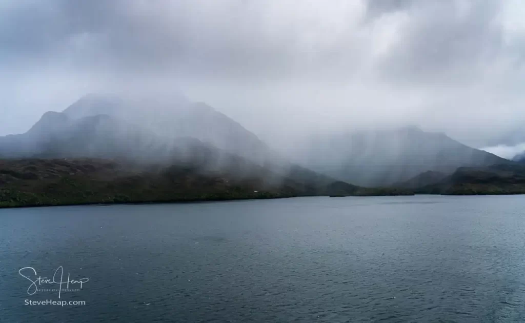 Heavy rain over the mountains on our cruise through the Chilean Fjords