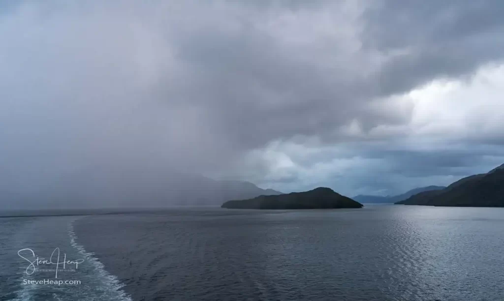 The rain clouds following the ship through the Chilean Fjords