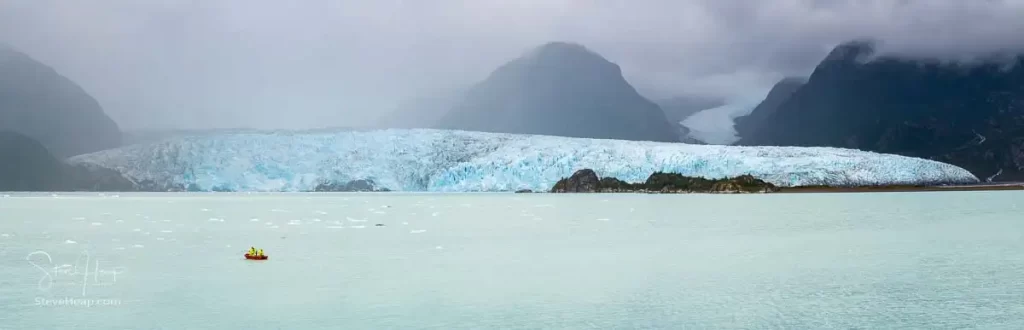 Crew of the Viking Jupiter in the water capturing some glacier ice to be served in drinks the following evening