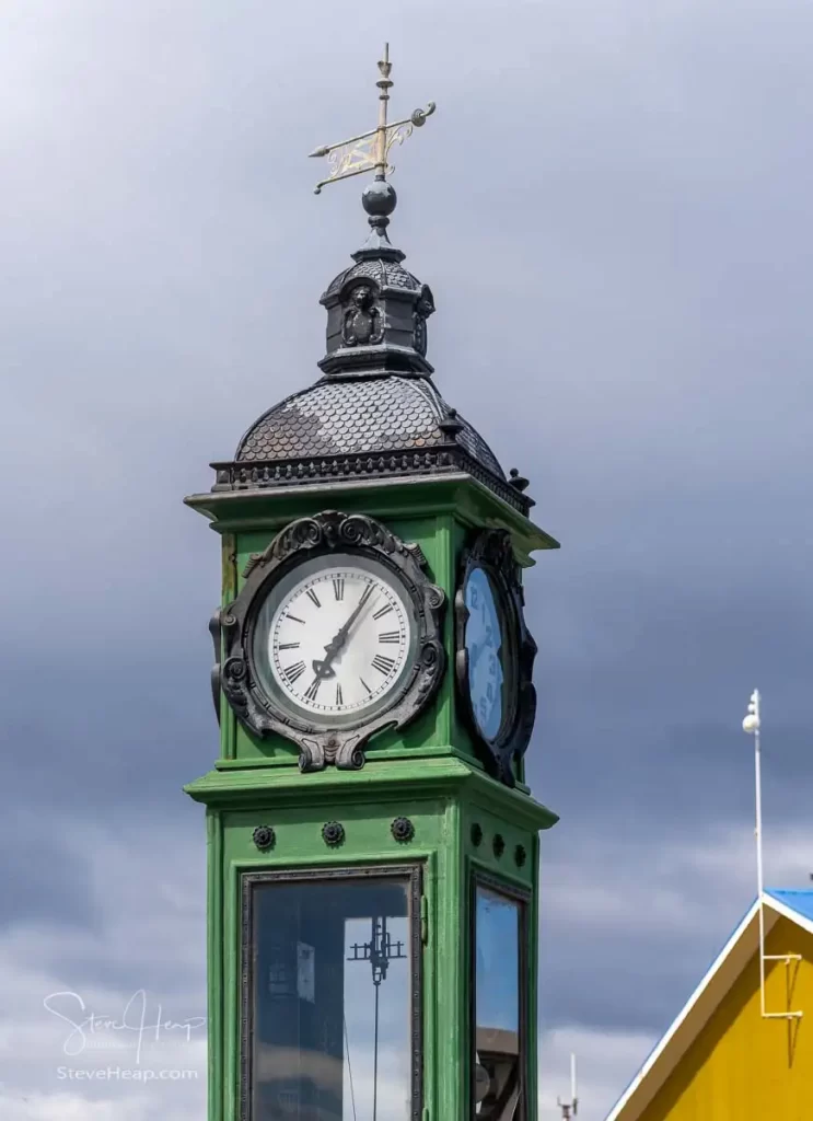 Close up of the antique clock guarding the port of Puerto Arenas. Prints available in my online store